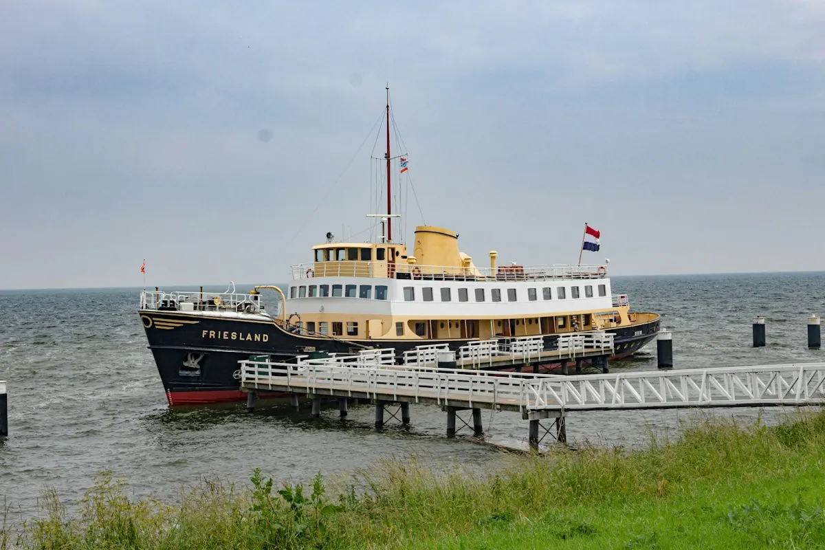 A steamship on the water, in black and white