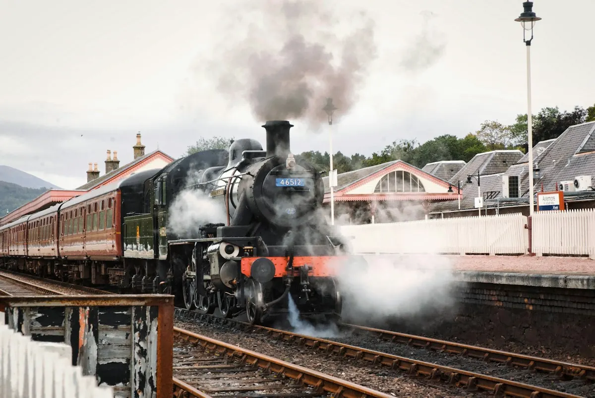 A vintage steam train at a station